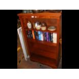 A yew wood open bookcase