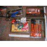 Various tools including chisels, drills