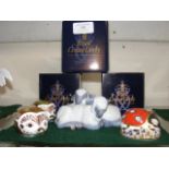 Three Royal Crown Derby paperweights, together wit