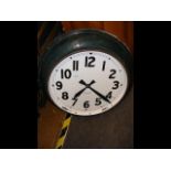 An old metal synchromatic electric station clock -