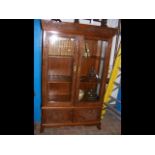 A Chinese display cabinet with cupboard below - wi