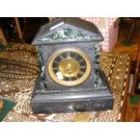 A Victorian slate and marble mantel clock by T.M T