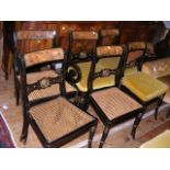 A set of six Regency japanned dining chairs