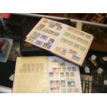 Four stamp book albums GB and World
