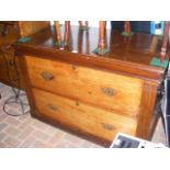 An antique chest of two large drawers