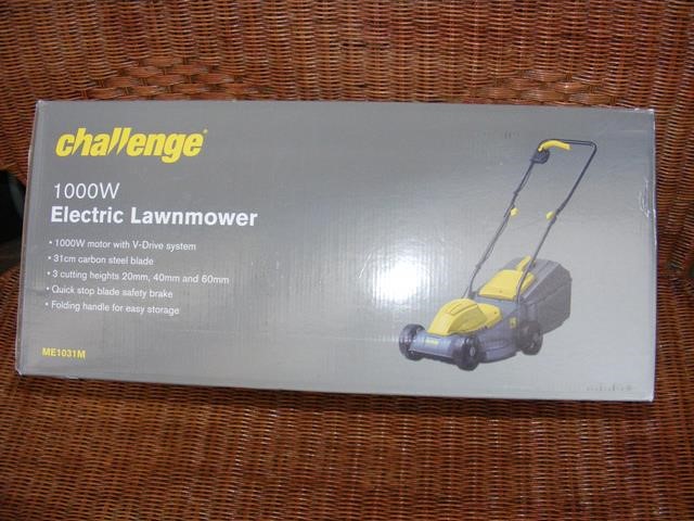 A new boxed electric lawn mower