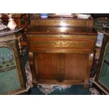 A Regency brass inlaid rosewood writing desk with