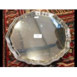 A 31cm diameter silver salver with Sheffield hallm