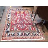A Middle Eastern rug with geometric border - 220cm