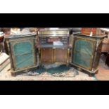 A pair of Victorian red boule pier display cabinets with Orm