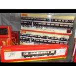 Two boxed Hornby 00 coach sets together with a sin