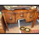A 19th century mahogany bow fronted sideboard on t