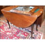 A Georgian mahogany pad foot drop leaf table - 110