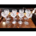 A set of eight cut glass wine glasses