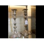 A pair of 31cm high silver weighted candlesticks w