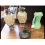 A pair of Doulton vases, green glass wine bottle a