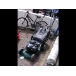 A Briggs & Stratton 500E series 140cc petrol lawn