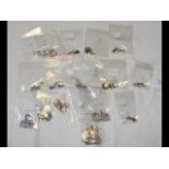 Twelve silver pairs of earrings marked 925 and fou