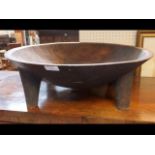 A 57cm diameter African carved wooden rice bowl