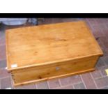 A low lying pine chest