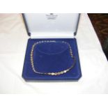 A ladies 9ct two tone gold necklace