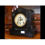 An Ansonia Clock Co. slate and marble mantel clock