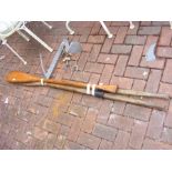 Vintage oars, anchor, together with rowlocks