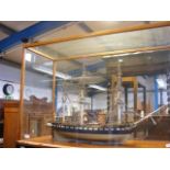 A model galleon in glass case - width 104cms