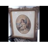An oval Victorian portrait of seated lady in gilt