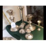 A selection of silver candlesticks