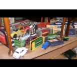 A collection of boxed die-cast vehicles, including