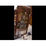 A wooden framed mirror, formerly from a wardrobe,