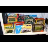 An assortment of boxed die-cast vehicles, includin