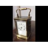 A 14cm high brass cased carriage clock