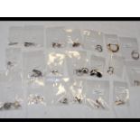 Twenty silver pairs of earrings all marked 925