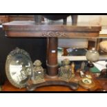 A 19th century rosewood fold over games table