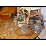 A collection of glass siphons and glass oil lamp c