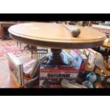 A Victorian mahogany extending dining table on sha