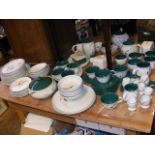 An extensive suite of Denby 'Green Wheat' service