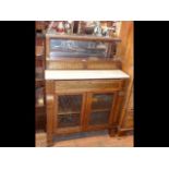 A Regency secretaire chiffonier - having brass inl