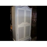 A shabby chic French two door wardrobe