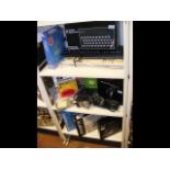 Three shelves of computer parts and accessories, i