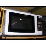 A Kenwood microwave in white