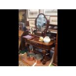 A Victorian mahogany duchess dressing table