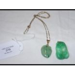 A carved jade pendant on chain together with one o