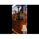 An Edwardian dressing table with two short and