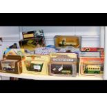 A quantity of boxed die-cast vehicles, including L