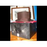 A Lester Bowden top hat in carry case