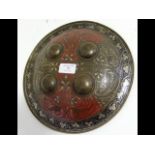 An old Dhal shield with engraved decoration - 27cm