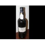 A bottle of Vintage 1934 Cossart Madeira Wine